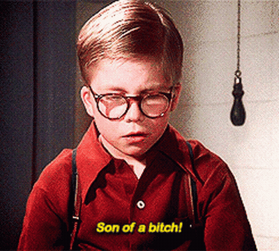A Young Boy Wearing Glasses And Suspenders Says Son Of A Bitch GIF