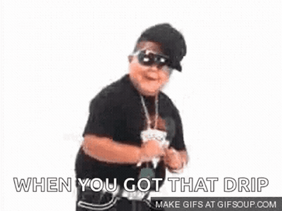 A Young Boy Wearing Sunglasses And A Hat Is Dancing . GIF