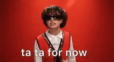 A Young Boy Wearing Sunglasses And A Red Vest Is Making A Funny Face And Says Ta Ta For Now . GIF