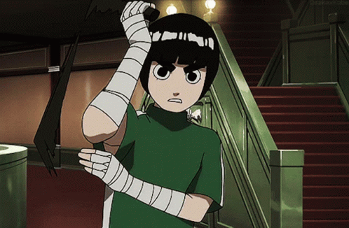A Young Boy With Bandages On His Arms Is Standing In Front Of A Set Of Stairs GIF