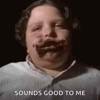 A Young Boy With Chocolate On His Face Is Making A Funny Face And Saying `` Sounds Good To Me '' . GIF