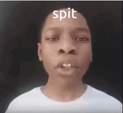 A Young Boy With The Word Spit Written Above His Head GIF