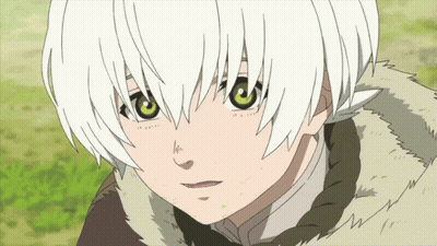 A Young Boy With White Hair And Green Eyes GIF
