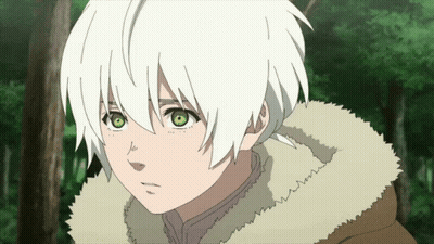 A Young Boy With White Hair And Green Eyes Looks At The Camera GIF