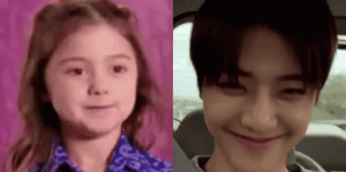 A Young Girl And A Young Boy Are Smiling For The Camera . GIF