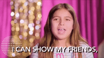 A Young Girl Is Making A Funny Face And Saying `` I Can Show My Friends , '' . GIF