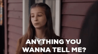 A Young Girl Is Sitting On A Porch Talking To A Man . GIF