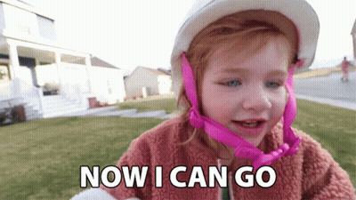 A Young Girl Wearing A Helmet Says Now I Can Go GIF