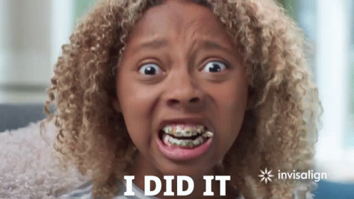 A Young Girl With Braces On Her Teeth Is Making A Funny Face With The Words I Did It In The Background GIF