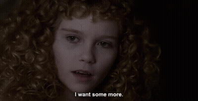 A Young Girl With Curly Hair Says I Want Some More GIF
