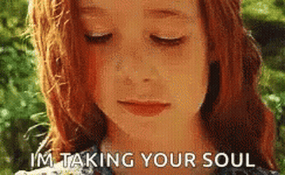 A Young Girl With Red Hair Is Taking Your Soul GIF