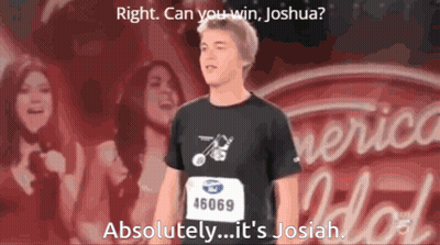 A Young Man In A Black Shirt With The Number 46969 On His Shirt GIF