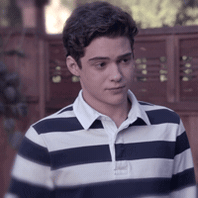 A Young Man In A Blue And White Striped Shirt GIF