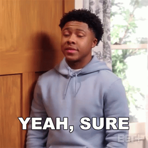 A Young Man In A Blue Hoodie Is Saying Yeah Sure GIF