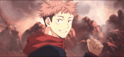 A Young Man In A Red Scarf Is Standing In Front Of A Mountain And Smiling . GIF