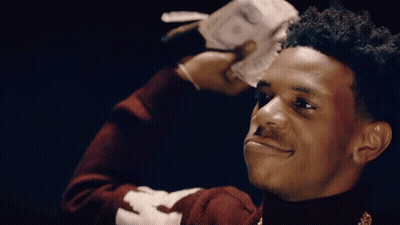 A Young Man In A Red Sweater With The Letter F On The Sleeve GIF