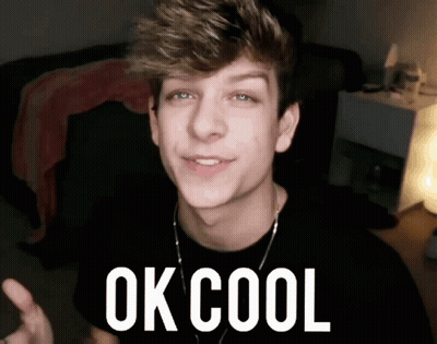 A Young Man Is Giving A Thumbs Up With The Words Ok Cool Behind Him GIF