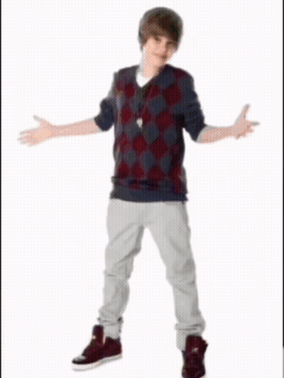 A Young Man Is Holding A Basketball In His Right Hand GIF