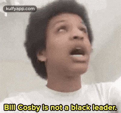 A Young Man Is Making A Funny Face And Says `` Bill Cosby Is Not A Black Leader '' . GIF