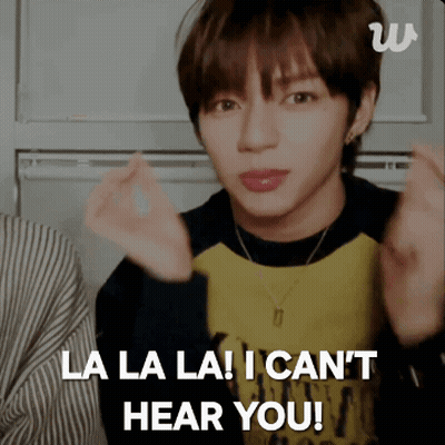A Young Man Is Making A Heart Shape With His Hands And The Words La La La I Can 'T Hear You GIF