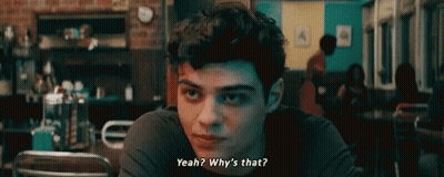 A Young Man Is Sitting At A Table In A Diner And Asking Why 'S That ? GIF