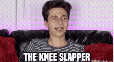 A Young Man Is Sitting On A Couch With The Words " The Knee Slapper " Above Him GIF