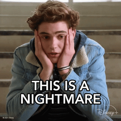 A Young Man Is Sitting On A Set Of Stairs With His Hands On His Face And The Words This Is A Nightmare Above Him GIF
