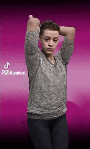 A Young Man Is Standing In Front Of A Pink Background With The Words Wiggle.ai On The Bottom Right GIF