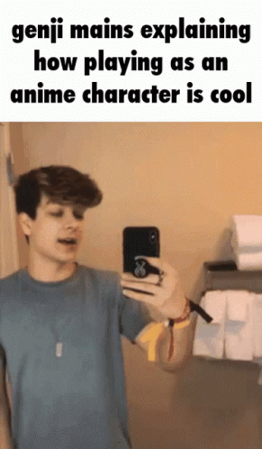 A Young Man Is Taking A Selfie In A Bathroom With A Caption That Says Genji Mains Explaining How Playing GIF