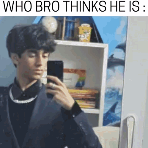 A Young Man Is Taking A Selfie In Front Of A Mirror With The Caption `` Who Bro Thinks He Is '' . GIF