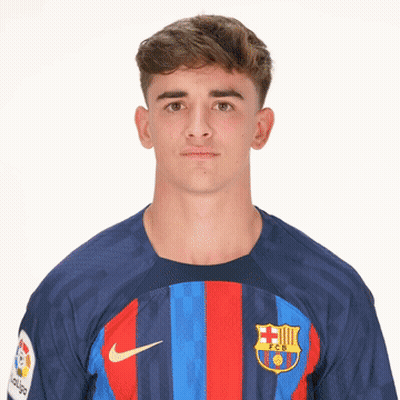 A Young Man Is Wearing A Blue And Red Nike Shirt GIF
