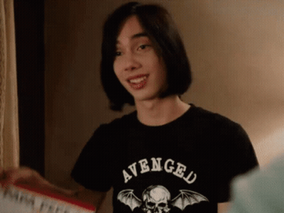 A Young Man Is Wearing An Avenged Shirt GIF