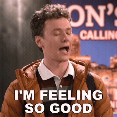 A Young Man Says I 'M Feeling So Good In Front Of A London Calling Sign GIF