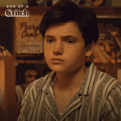 A Young Man Says " I 'M Not A Kid Anymore " In A Striped Shirt GIF