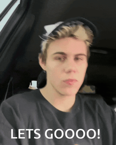 A Young Man Sitting In A Car With The Words Lets Goooo On The Bottom GIF