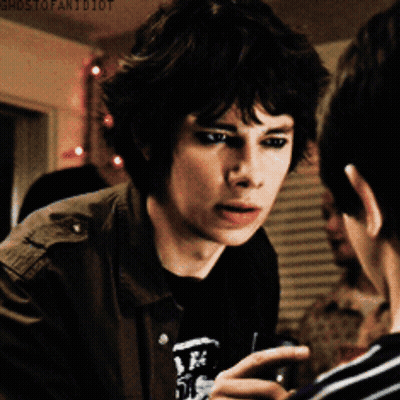 A Young Man Talking To Another Young Man With Ghostofanidiot Written On The Bottom Of The Image GIF