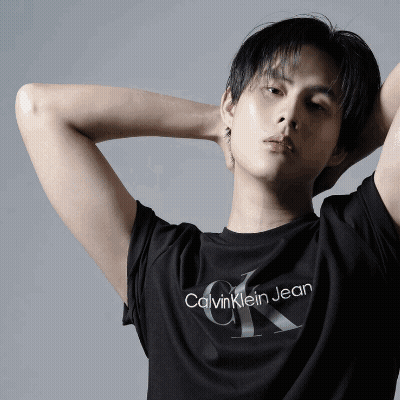 A Young Man Wearing A Black Calvin Klein Jean T-Shirt GIF