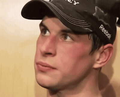 A Young Man Wearing A Black Reebok Hat GIF