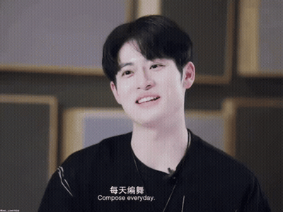 A Young Man Wearing A Black Shirt And A Necklace Says Compose Everyday GIF
