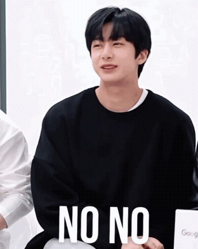 A Young Man Wearing A Black Sweater Says " No No " GIF