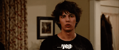 A Young Man Wearing A Black T-Shirt That Says Vep GIF