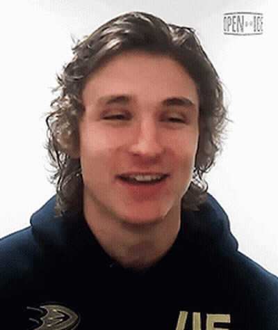 A Young Man Wearing A Blue Hoodie With The Word Ice On It GIF