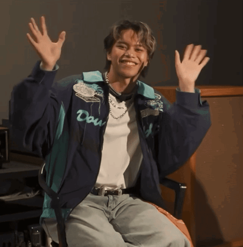 A Young Man Wearing A Blue Jacket With The Word Dow On It GIF