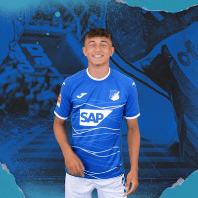 A Young Man Wearing A Blue Shirt With The Word Sap On It GIF