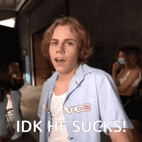 A Young Man Wearing A Blue Shirt With The Word Vice On It GIF