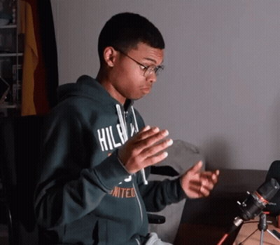 A Young Man Wearing A Green Hoodie That Says United On It GIF