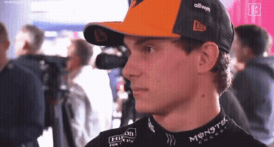 A Young Man Wearing A Hat And A Black Shirt With Monster Energy On It . GIF
