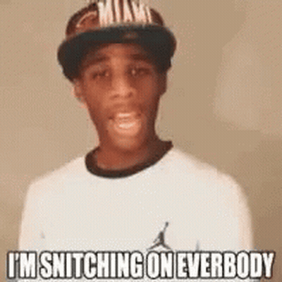 A Young Man Wearing A Hat And A White Shirt Is Smiling And Saying `` I 'M Snitching On Everybody '' GIF