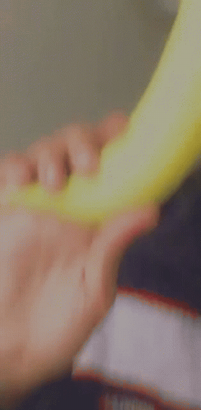 A Young Man Wearing A Hat Is Holding A Frisbee In His Hand And Blowing A Kiss . GIF
