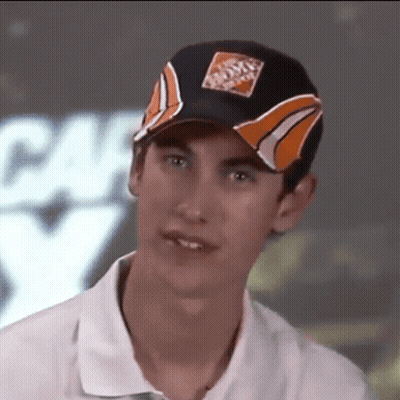 A Young Man Wearing A Home Depot Hat Looks At The Camera GIF